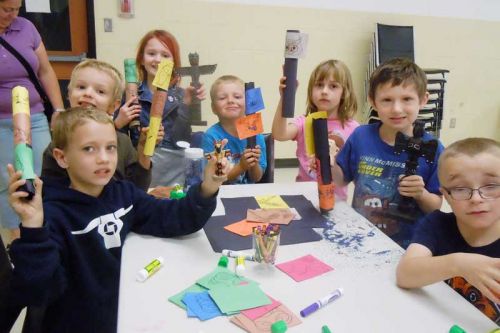 youngsters enjoyed making totem poles at the eighth annual Strawberry Moon Festival